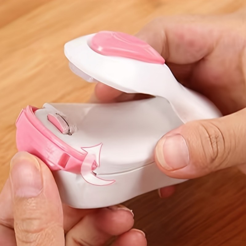 dropship 1pc Mini Household Portable Sealing Machine, Hand Pressure, Heat Sealing Machine, Food, Snacks, Plastic Bag Sealing Machine (Battery Not Included)