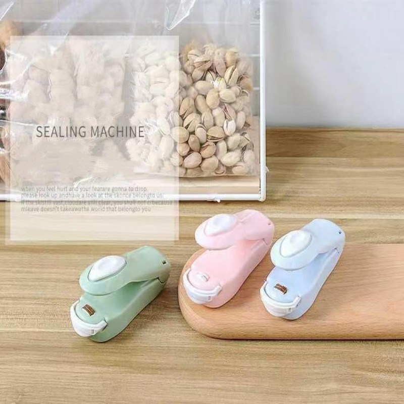 dropship 1pc Mini Household Portable Sealing Machine, Hand Pressure, Heat Sealing Machine, Food, Snacks, Plastic Bag Sealing Machine (Battery Not Included)