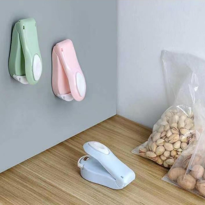 dropship 1pc Mini Household Portable Sealing Machine, Hand Pressure, Heat Sealing Machine, Food, Snacks, Plastic Bag Sealing Machine (Battery Not Included)